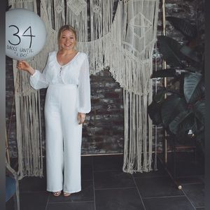 White Ruffled Long Sleeve Jumpsuit